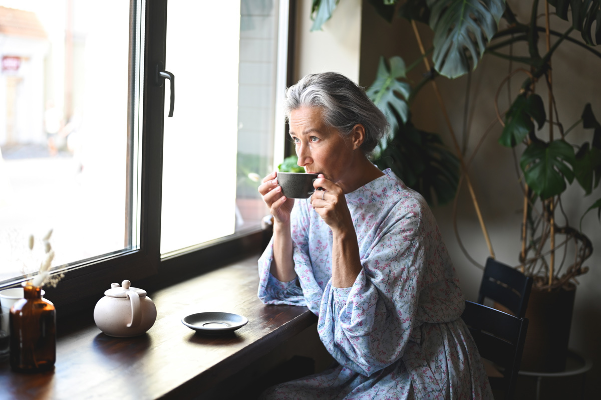 Women drinking hot drink in a cafe