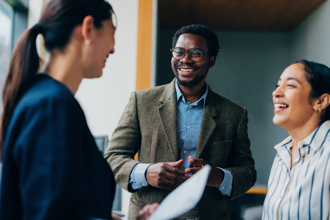 Group of employees laughing together