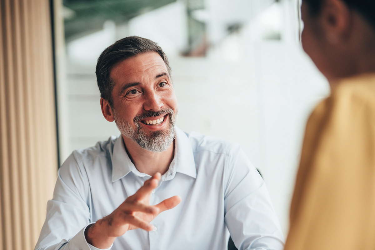 Male adviser speaking to a client