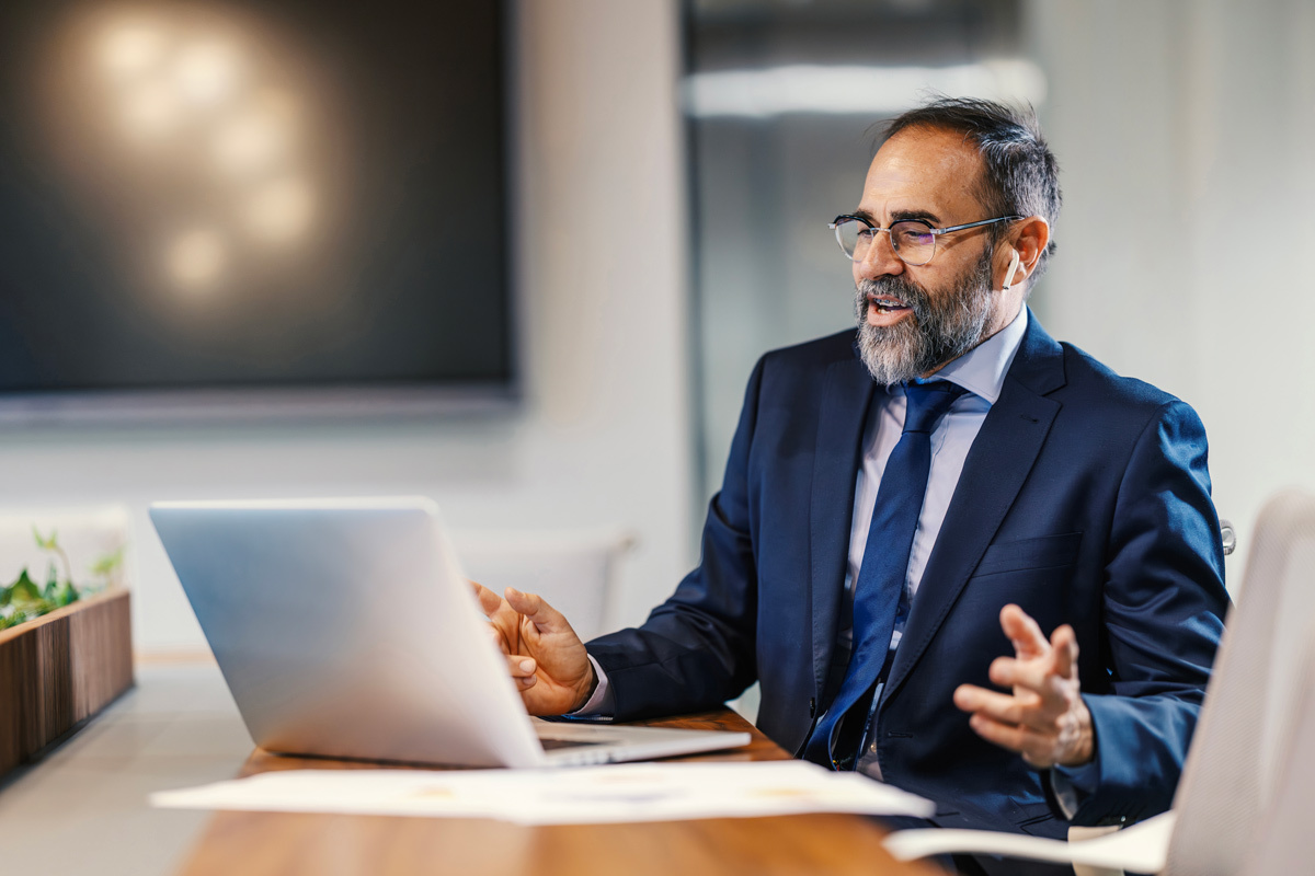 Adviser speaking to client on video chat